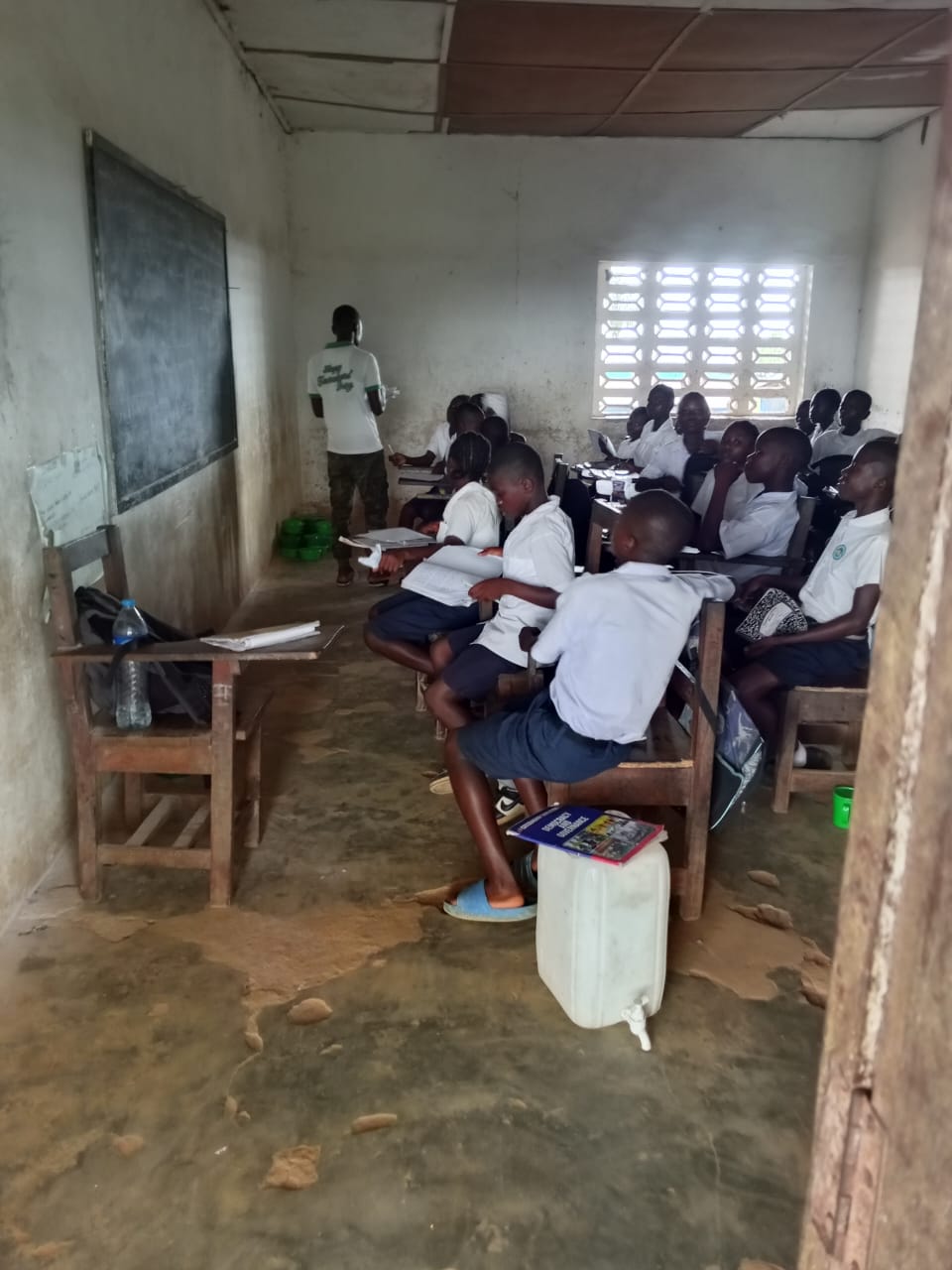 Teacher with students in classroom