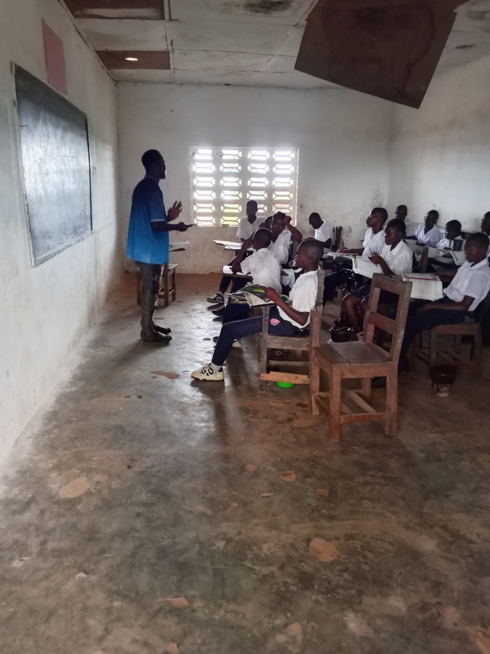 Teacher and students in a classroom at Newcess Public School